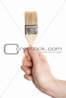 Hand with a brush