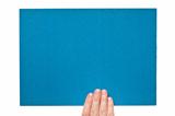 Blue paper in woman hand