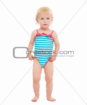 Full length portrait of baby in swimsuit