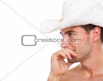 Profile portrait of young man in beach hat looking on copy space