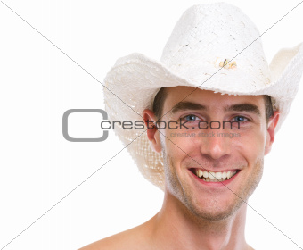 Portrait of smiling young man in hat