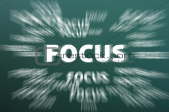 Focus word with motion rays on green chalkboard background 
