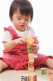 Little Asian girl playing