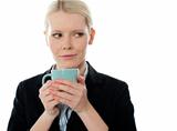 Coporate woman holding coffee mug