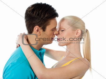 Young couple hugging and kissing