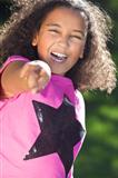 Mixed Race African American Girl Smiling & Pointing
