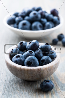 Blueberries in small stone containers