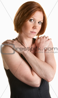 Serious Woman Holding Shoulders