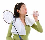 Drinking water after playing badminton