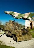 Military vehicle and MIG 21 airplane 
