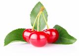 sweet juicy cherry with green leaf