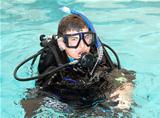 Young man in scuba diving equipment.