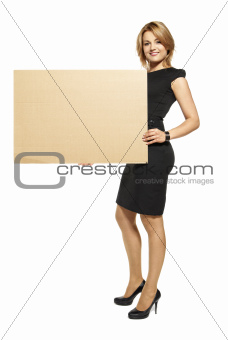 Attractive Woman Holding Up a Blank Sign - Isolated