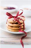 Cranberry and orange cookies tied with ribbon
