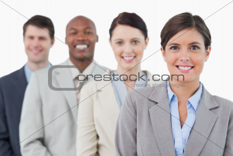 Smiling young businessteam standing