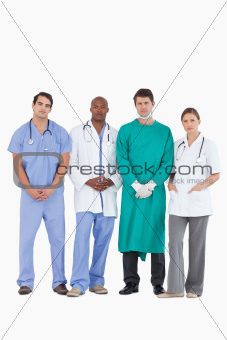 Confident medical team standing together