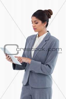 Saleswoman using tablet computer