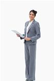 Smiling saleswoman with clipboard