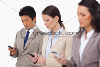Young businessteam with their cellphones