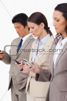 Group of businesspeople with their cellphones