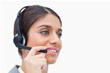 Side view of female call center agent with headset