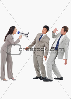 Saleswoman with megaphone yelling at colleagues