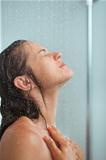 Portrait of woman bathing in shower
