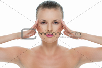 Beauty portrait of young woman with hands on temples isolated on white