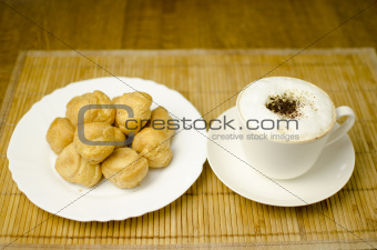 Coffee with cream puffs