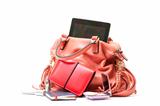 Pink Leather Ladies Handbag with Tablet PC on white background 