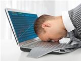 businessman sleeping on the laptop