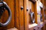 Metal Knocker on ancient wooden door