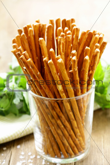 salty snack bread sticks in a glass on the table