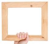 Wooden frame in hand