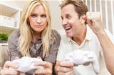 Couple Having Fun Playing Video Console Game