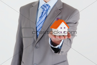 Businessman with a house