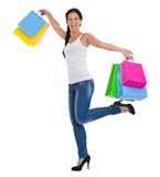 Full length portrait of cheerful girl with shopping bags