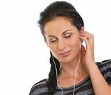 Portrait of girl with headphones relaxing by listening music