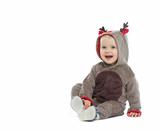 Smiling baby in Christmas costume looking on copy space