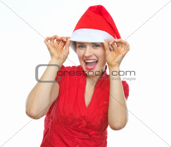 Happy woman in Christmas hat funny posing
