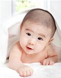 asian baby with towel