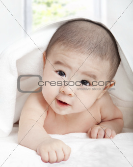 asian baby with towel
