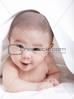  adorable baby lying on the bed