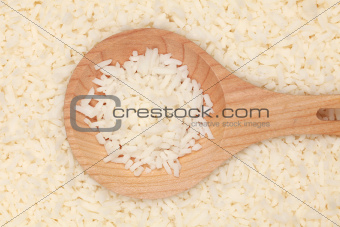 Rice on a wooden spoon