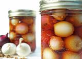 Two jars with onions