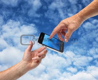 Two hands reaching smartphone