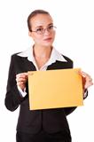 Serious young woman in business suit with yellow paper