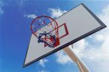 Basket ball hoop with blue sky