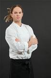Male chef standing with arms crossed