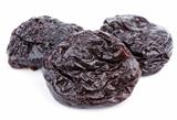 Dried plum fruits - prunes on white